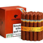 Cohiba cigars bundle with red box displaying health warning label on white background