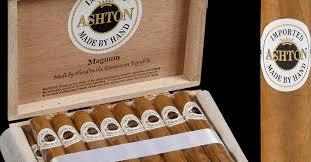 Ashton Magnum premium cigars displayed in an open wooden humidor box, imported handmade cigars from Dominican Republic